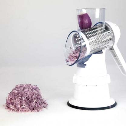 Vegetable cutter process onions into shredded pieces as shown in a small glass bowl
