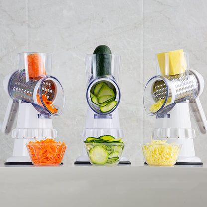 3 in 1 vegetable cutter process carrot, cucumber, and cheese into shredded pieces, with each ingredient shown in a small glass bowl below its respective cutter.